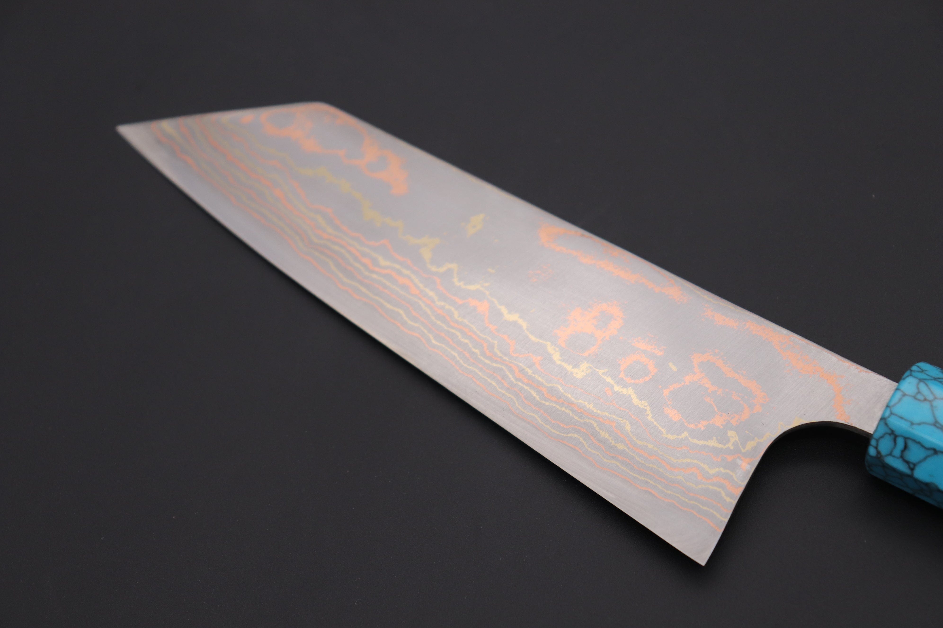 https://japanesechefsknife.com/cdn/shop/files/takeshi-saji-bunka-custom-limited-edition-takeshi-saji-rainbow-damascus-bunka-180mm-7-inch-stcl-263-42702336262427.jpg?v=1694495196