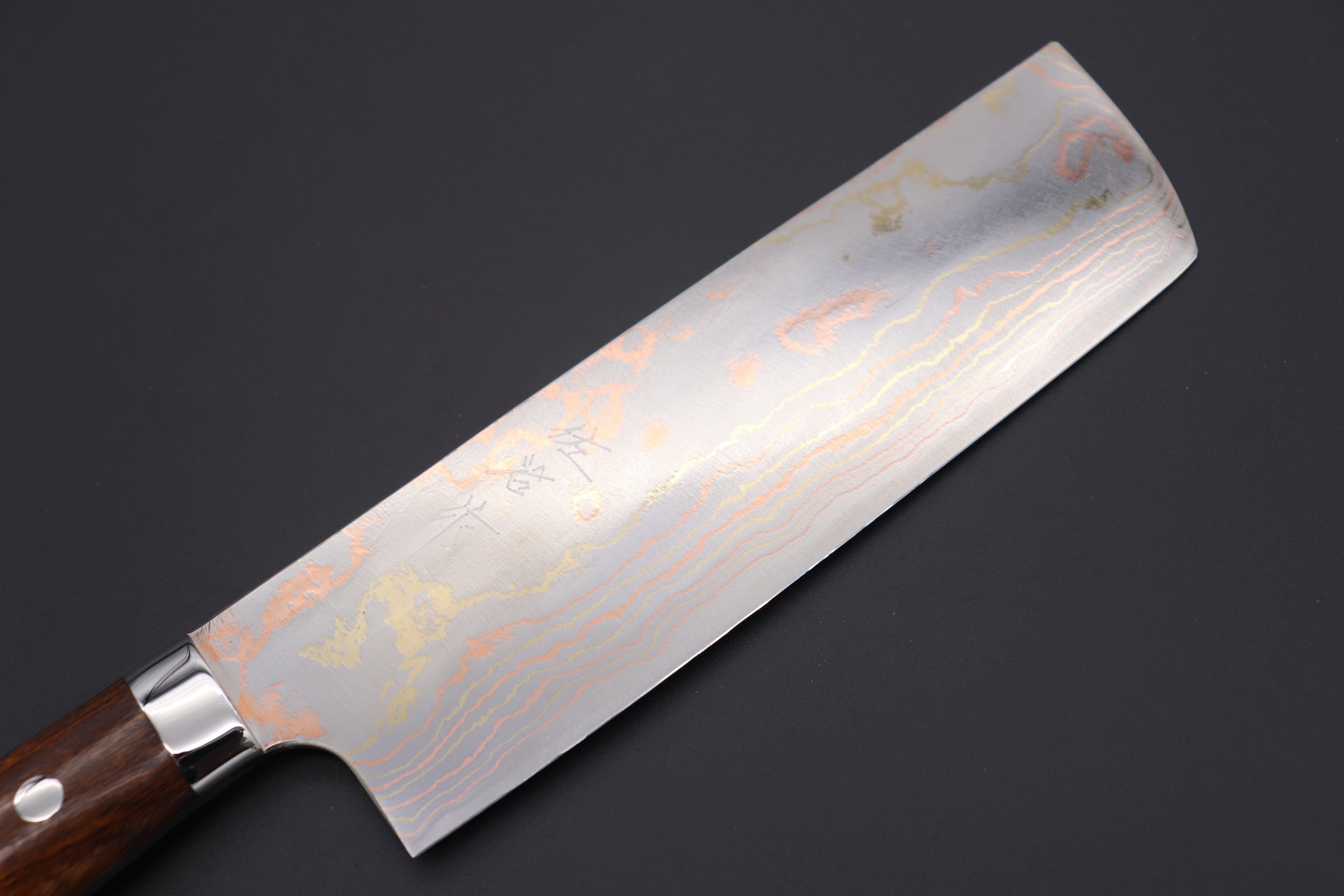 https://japanesechefsknife.com/cdn/shop/files/takeshi-saji-nakiri-master-saji-rainbow-damascus-series-nakiri-165mm-6-4-inch-ironwood-handle-42212073767195.jpg?v=1690944353