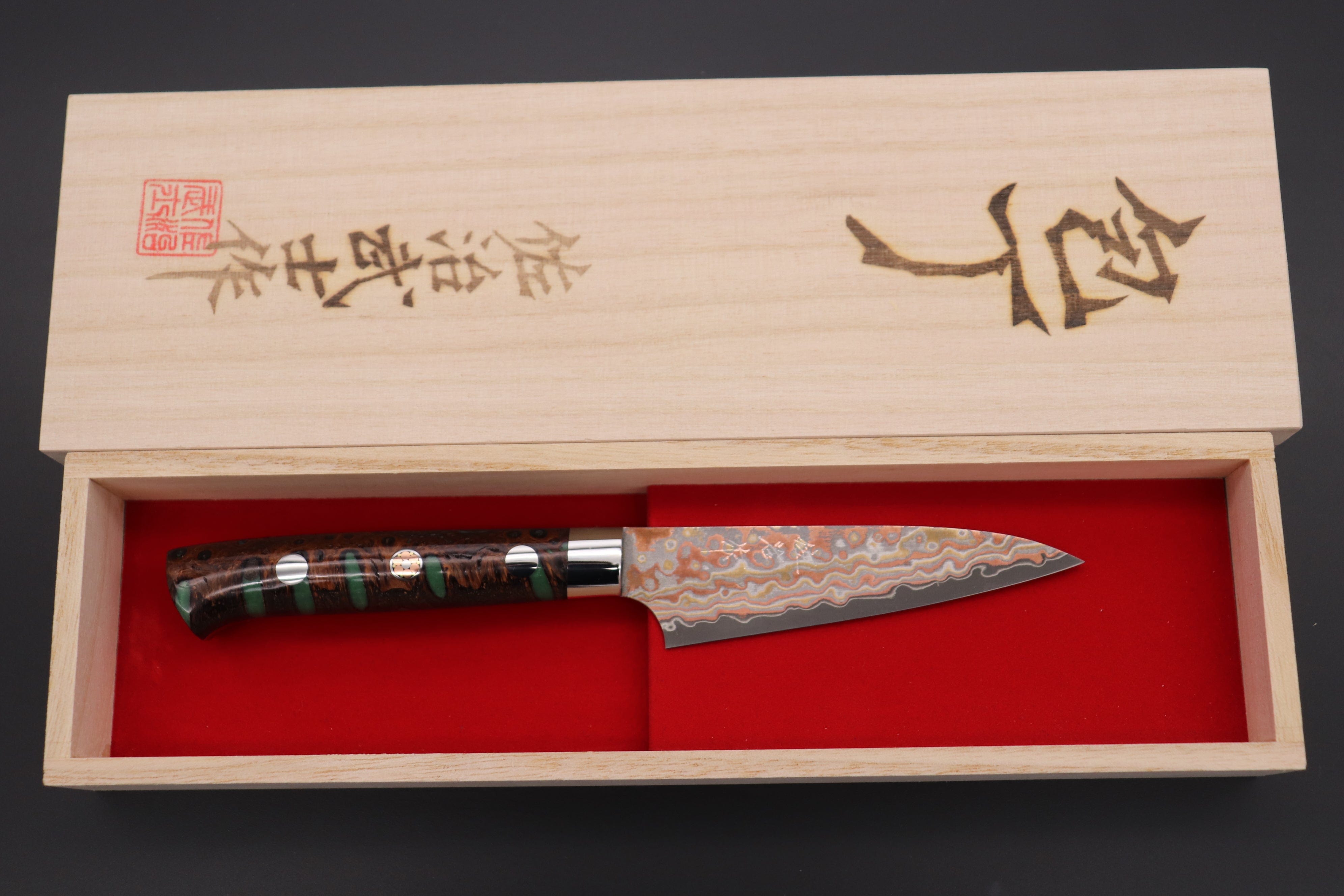 https://japanesechefsknife.com/cdn/shop/files/takeshi-saji-paring-takeshi-saji-summit-limited-edition-custom-series-smt-660-vg-10w-multi-colored-golden-rainbow-damascus-series-paring-95mm-3-7-inch-43012143874331.jpg?v=1696217453