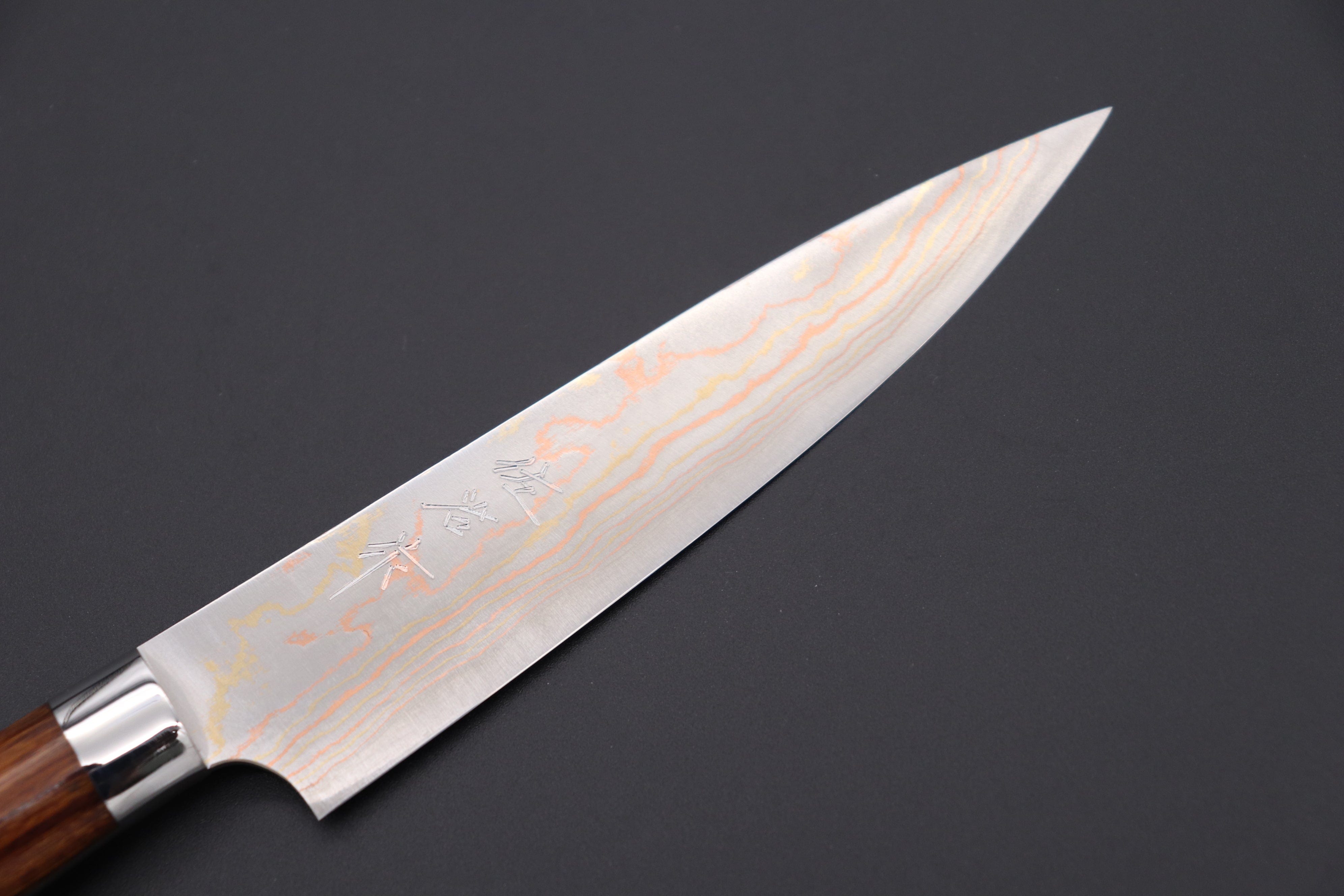 https://japanesechefsknife.com/cdn/shop/files/takeshi-saji-petty-master-saji-rainbow-damascus-series-petty-135mm-and-150mm-ironwood-handle-42212100604187.jpg?v=1690943810