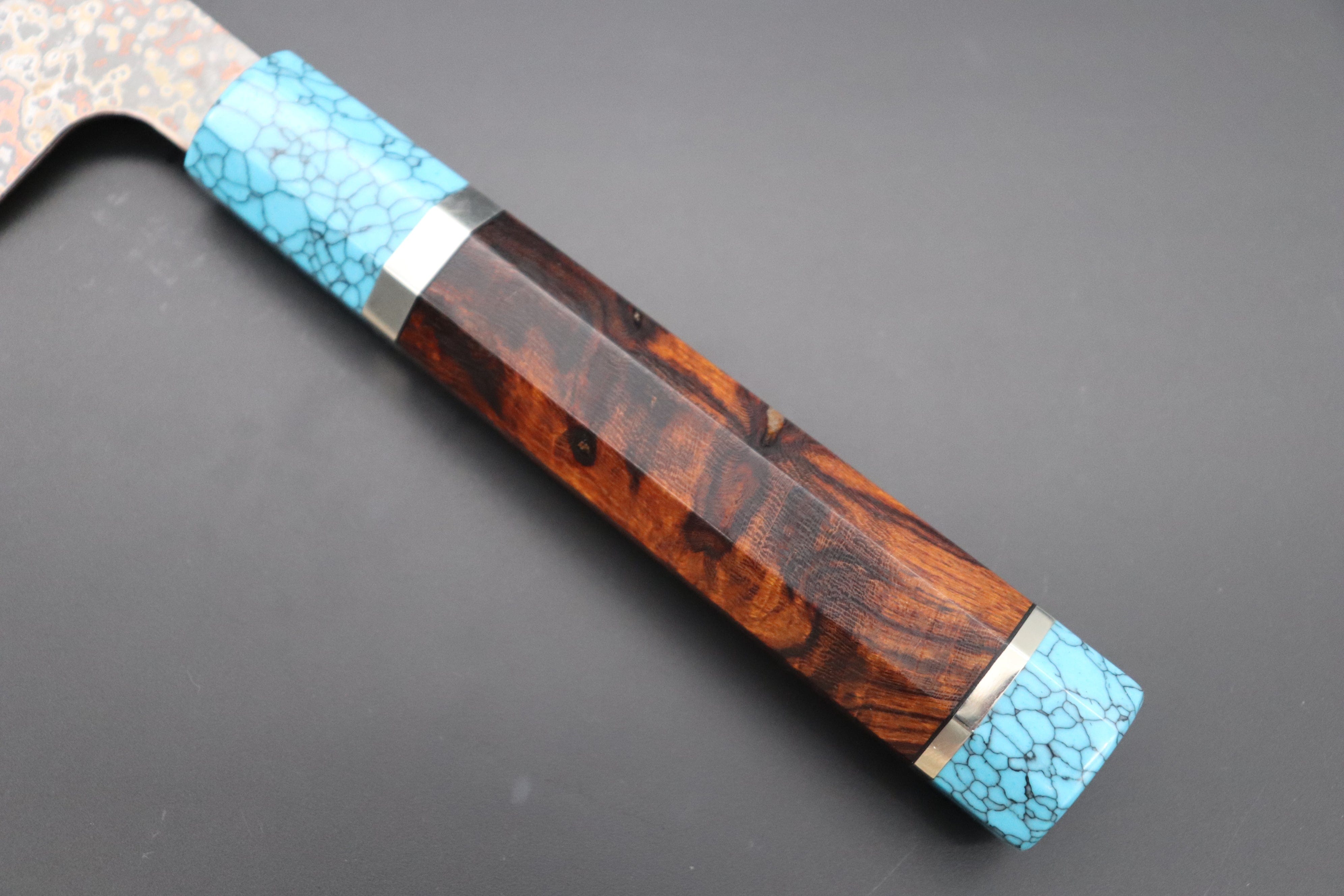 https://japanesechefsknife.com/cdn/shop/files/takeshi-saji-wa-gyuto-custom-limited-edition-takeshi-saji-vg-10w-multi-colored-golden-rainbow-damascus-series-gyuto-240mm-9-inch-stcl-286-43219822870811.jpg?v=1697506068