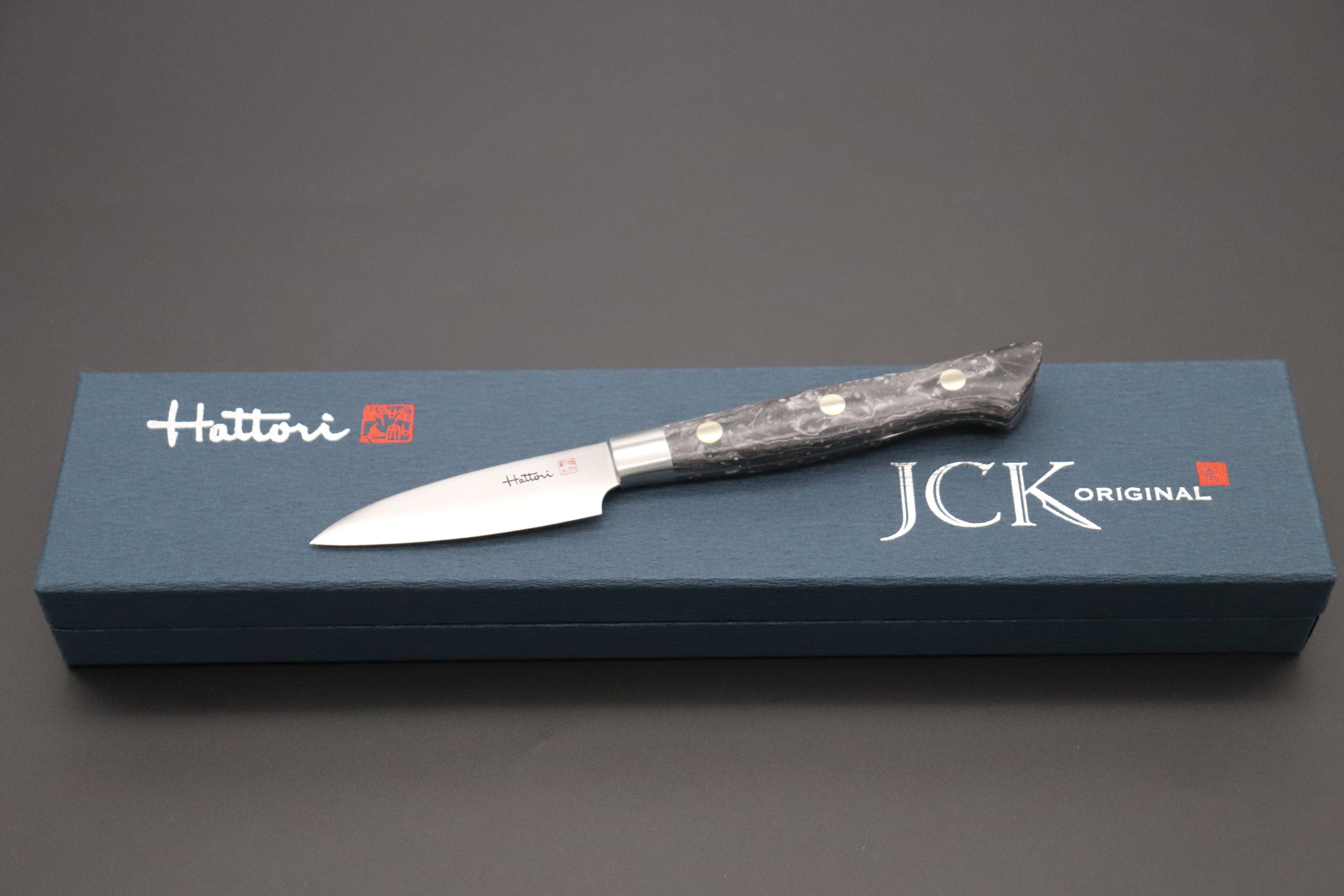 https://japanesechefsknife.com/cdn/shop/products/hattori-paring-hattori-forums-fh-series-limited-edition-snow-in-the-dark-fh-1nd-parer-70mm-2-7-inch-dupont-corian-handle-40239295070491.jpg?v=1685940897
