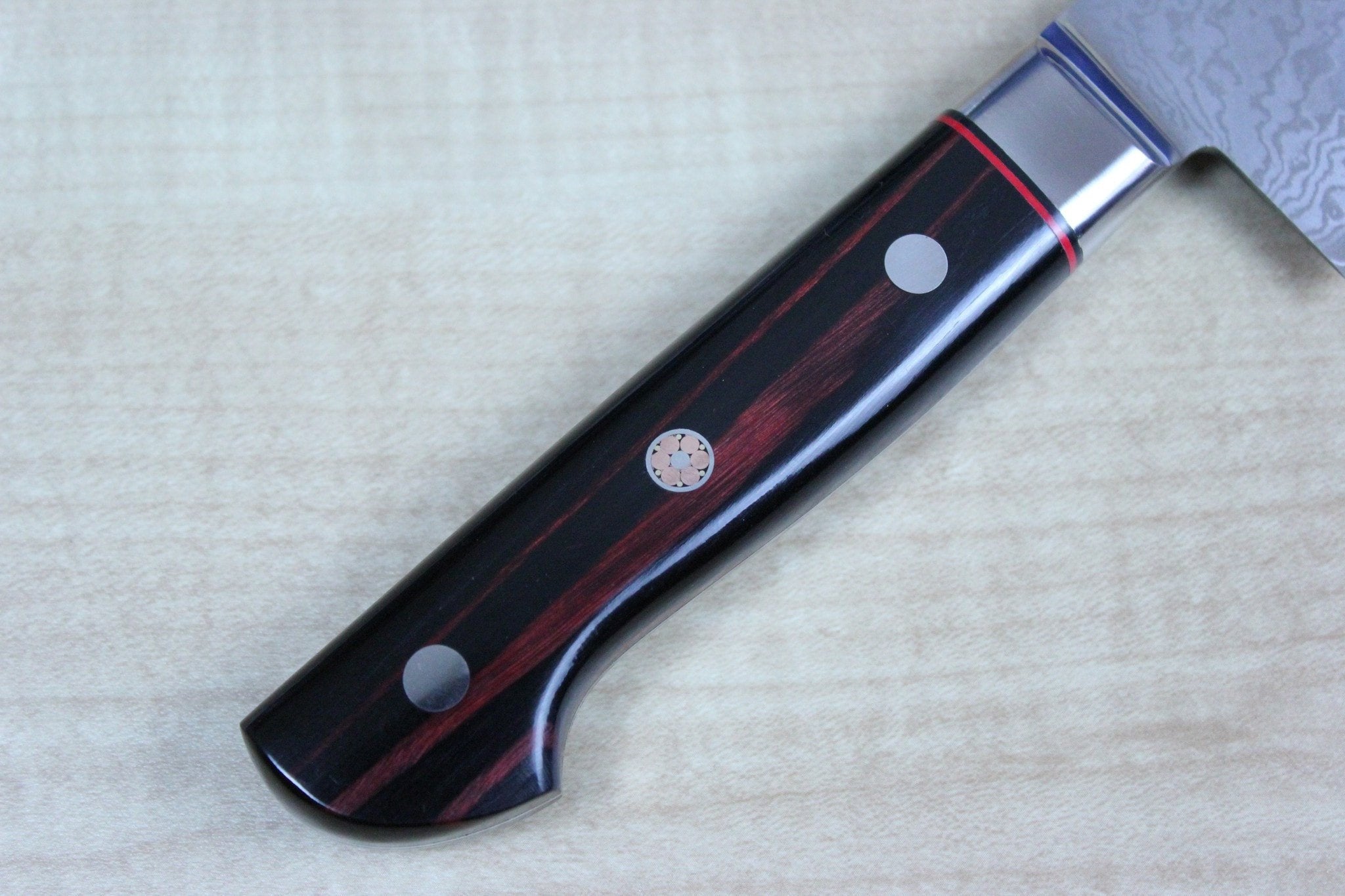 https://japanesechefsknife.com/cdn/shop/products/shiki-gyuto-shiki-shikisai-series-gyuto-180mm-to-240mm-3-sizes-black-pakka-wood-handle-with-red-stripes-21558043790.jpg?v=1574701447