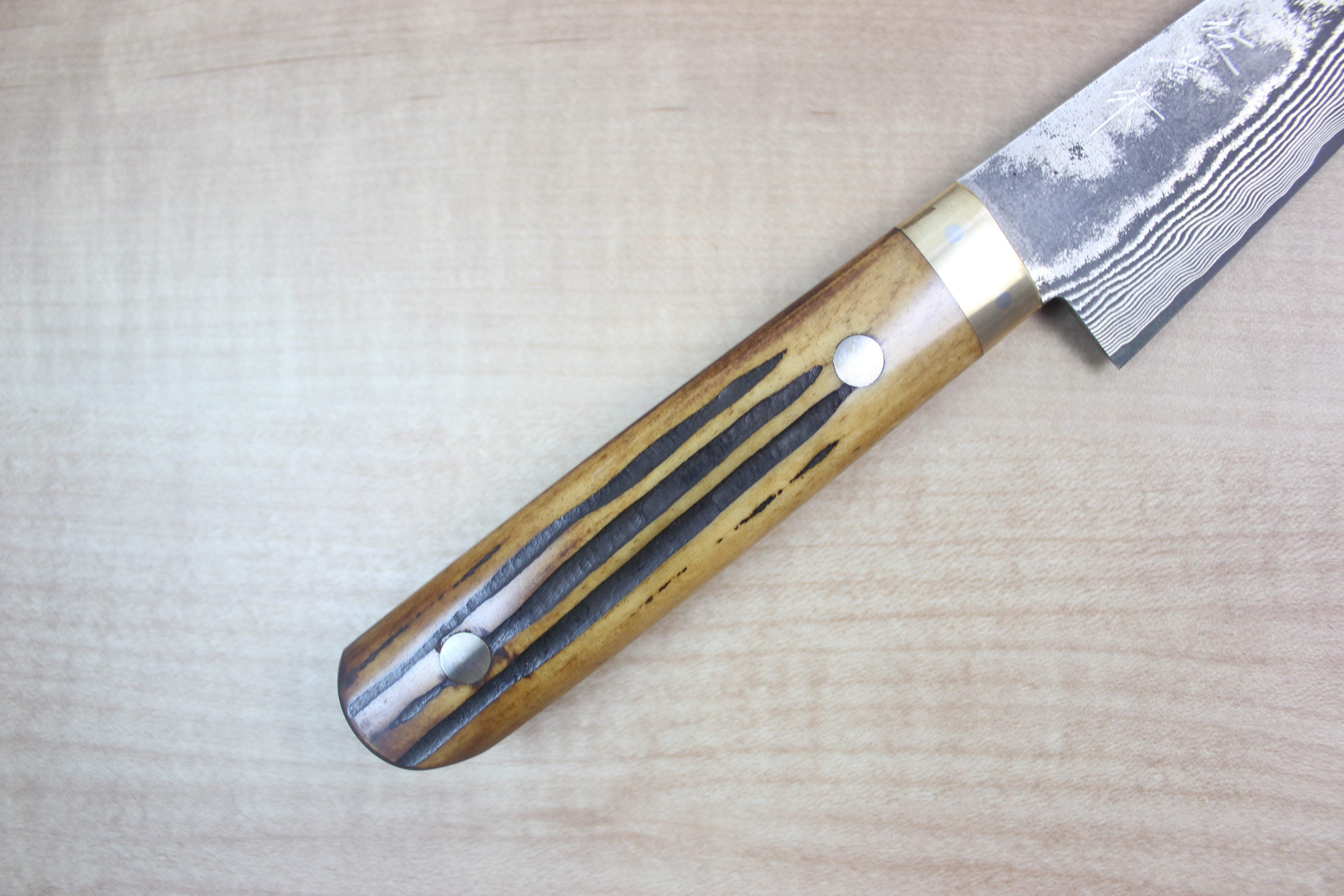 https://japanesechefsknife.com/cdn/shop/products/takeshi-saji-boning-knife-honesuki-takeshi-saji-vg-10-custom-damascus-wild-series-honesuki-boning-knife-150mm-5-9-inch-stag-bone-handle-3909784109153.jpg?v=1574700306